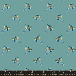 May include: A teal blue fabric with a repeating pattern of small bouquets of flowers in shades of orange, yellow, green, and blue. The bouquets are tied with a white ribbon.
