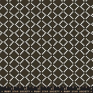 May include: Black and white geometric pattern fabric with a repeating diamond shape design.