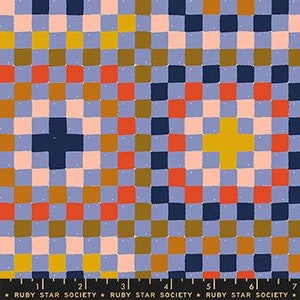 May include: Close-up of a fabric with a checkerboard design. The squares are in shades of blue, orange, yellow, and pink. A ruler is at the bottom with the text "RUBY STAR SOCIETY".