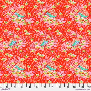 May include: Red fabric with a repeating pattern of pink flowers, green leaves, and blue and white cartoon hedgehogs. The fabric has a ruler with inches marked on it.
