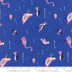 May include: A blue fabric with a repeating pattern of pink and black birds. The birds are stylized and have a whimsical design.
