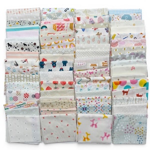 May include: A selection of fabric squares with diverse patterns and colours. Designs include floral, geometric, and whimsical motifs. Some squares feature text, with a colour palette of pink, blue, white, and beige.