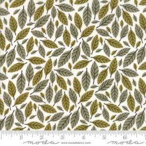 May include: White fabric with a repeating pattern of green and brown leaves. The fabric is from Moda Fabrics and has the text "moda" printed on the bottom.