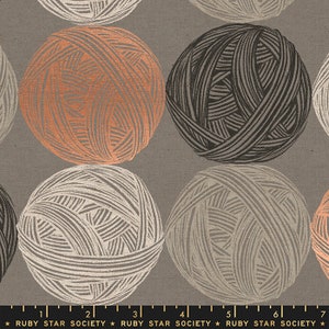 May include: Fabric with a repeating pattern of yarn balls in shades of orange, black, and white on a gray background. The image includes the text "RUBY STAR SOCIETY" at the bottom.