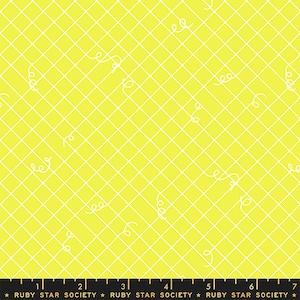May include: Yellow fabric with a white grid pattern and white squiggly lines. The fabric has a ruler with the words "Ruby Star Society" printed on it.
