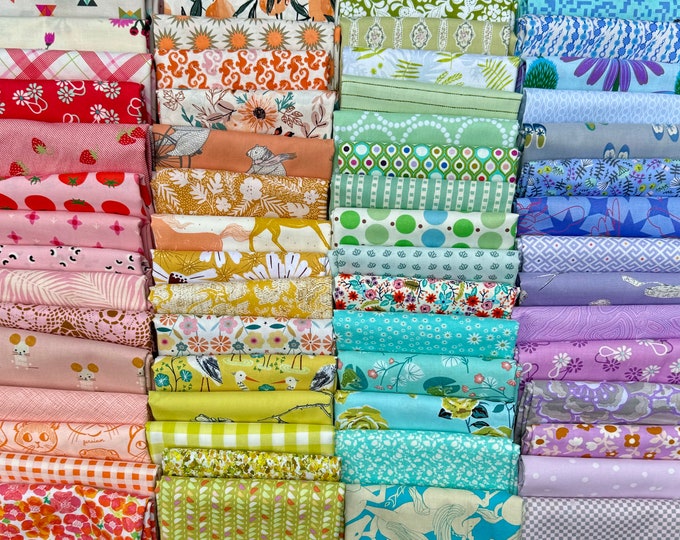 Fat 16th of various designer pastel fabrics as shown in photo (64 in total)