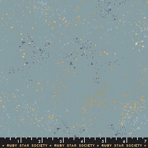 May include: A blue fabric with a speckled pattern of gold and grey dots. The fabric is a light blue colour with a subtle sheen. The dots are randomly scattered across the fabric, creating a unique and interesting design.