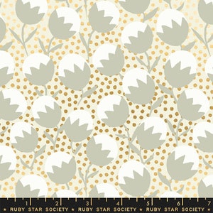 May include: A white and cream fabric with a repeating pattern of grey and white stylized flowers on a background of gold polka dots. The fabric has a subtle sheen and a soft texture.