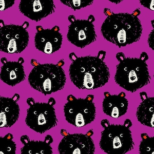 May include: A seamless pattern of black bear faces on a purple background. The bears have white noses and eyes, and their fur is drawn with a textured brushstroke.