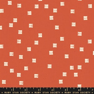 May include: Red fabric with a white square pattern. The fabric has a subtle texture and the squares are randomly placed.