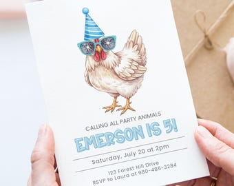 May include: A white invitation card featuring a cartoon chicken wearing sunglasses and a party hat. The text reads "CALLING ALL PARTY ANIMALS EMERSON IS 5!" with event details. The card is held by a person.