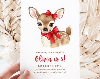 May include: A white invitation card featuring a watercolor illustration of a fawn with a red bow. The text "OH DEER, IT'S A PARTY! Olivia is 8!" is written in red. Additional details include the date, time, and RSVP information.