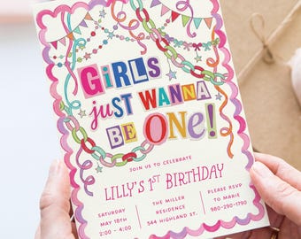 May include: A rectangular invitation card with a scalloped pink and purple border. The text reads GIRLS JUST WANNA BE ONE! JOIN US TO CELEBRATE LILLY'S 1ST BIRTHDAY. Details include Saturday May 18th, 2:00-4:00, The Miller Residence, 544 Highland St.