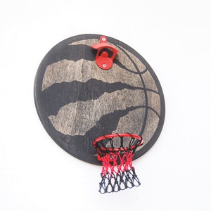 Abridor de botellas de pared con aro de baloncesto de los Toronto Raptors