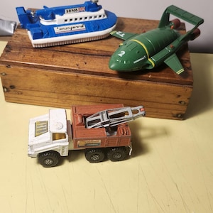 3 vintage diecast Matchbox-fordon