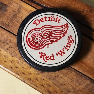 1980s Trench Mfg Detroit Red Wings Hockey Puck