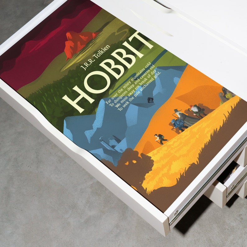 Hand-drawn Hobbit poster inspired by J.R.R. Tolkien, colorful fantasy illustration with bold title lettering, perfect for Middle-earth fans.