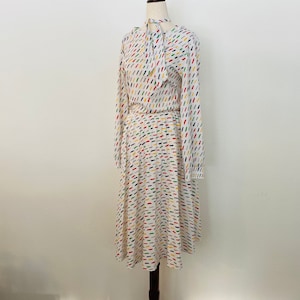Vintage 1970's Confetti Skirt set. Pleated Midi skirt. Boatneck top. Neck javot.
