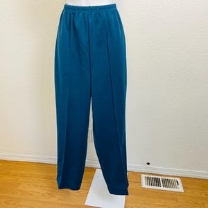 Vintage 1970s polyester slacks. Blue. Size 16. Elastic waistband