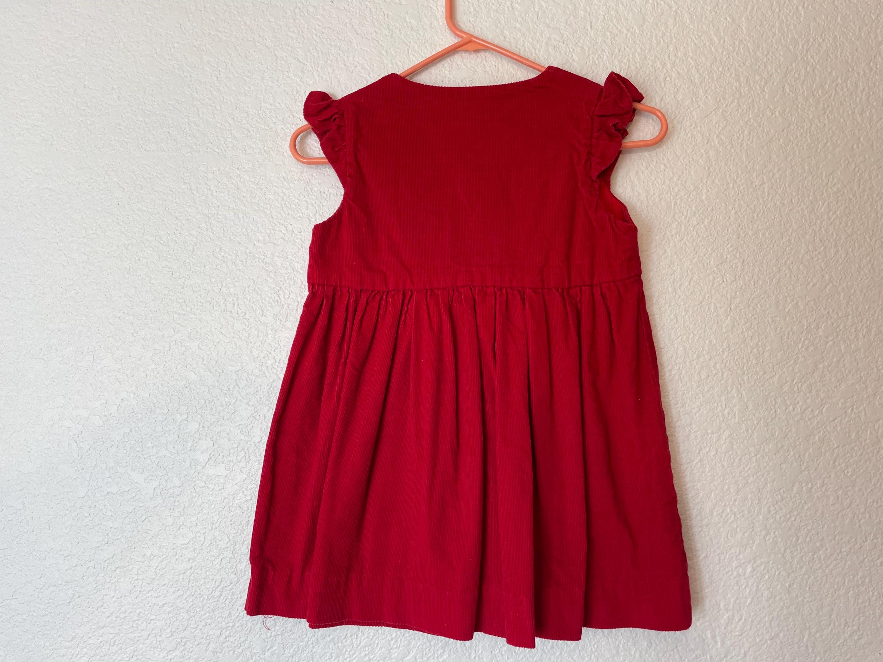 red corduroy pinafore dress Red corduroy pinafore dress with free white