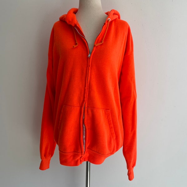 1970s oreslan acrylic zip down day glo orange hoodie. metal zip. single stitch. size large. great color. Classic seventies hoodie sweater