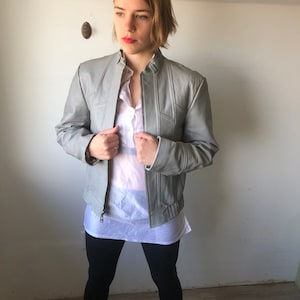 Vintage size small 90s grey leather motorcycle jacket. Cevy. Grey Colored Leather. Genuine leather. Motorcycle Jacket. Korea