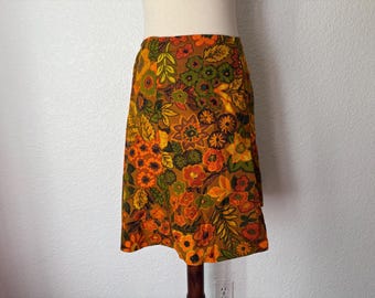 size L Vintage 1960s/70's Brown, yellow, orange cotton floral print mini skirt.