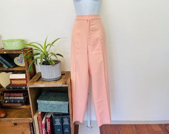 Vintage 1970er Jahre Hose aus Polyester. Orangefarbene Levi-Hosenhose. Super Beuge über niedlichen Hintern. Klassisches Ende 1970er Anfang 1980er Jahre Stil.Grösse 36.