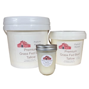 May include: Three containers of grass-fed beef tallow, one small glass jar and two white plastic buckets. The labels on the containers read "Premium Grass Fed Beef Tallow, Pasture Raised, Processed in Thorp, WI, www.thedailysoak.etsy.com".