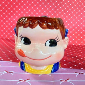 SALE Kawaii Milky Peko chan 3D Face Fujiya sweet mascot vintage retro ceramic mug cup with ponytail handle Japanese collectible from Japan