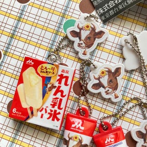 May include: A rustic wooden sign with the text "Welcome to our home" in white lettering. The sign features a distressed finish and a simple, inviting design, perfect for entryway decor.