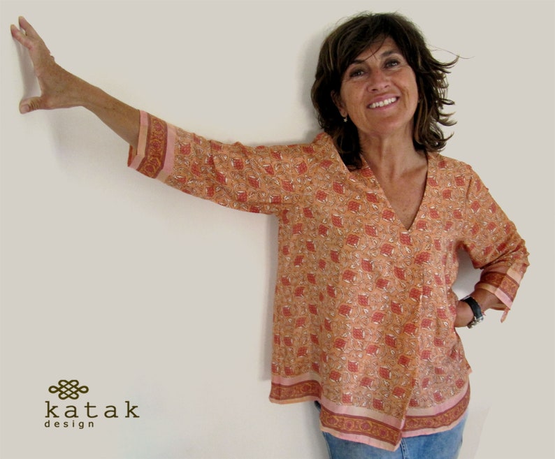 women indian orange printed tunic made with fabric of indian sarees