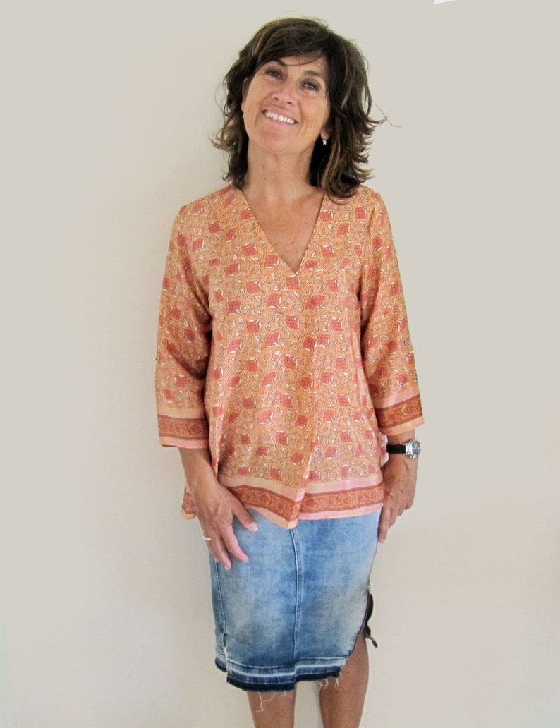 women indian orange printed tunic made with fabric of indian sarees