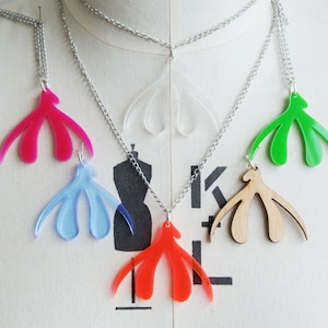 Laser Cut Clit Necklaces for FGM Charity