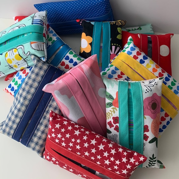 Pocket tissue holder, 3 for 12.00 Comes with tissue pack. I make these from high quality cotton fabrics. Great for your purse,car,backpack