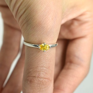 Radiant Sunshine: A Stunning Yellow Oval Diamond Ring - Stacking Rings - Unique Gifts