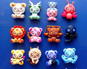 May include: Twelve zodiac signs represented as cute cartoon animals. Each animal is made of colorful clay and has a unique design. The signs are: Aries, Taurus, Gemini, Cancer, Leo, Virgo, Libra, Scorpio, Sagittarius, Capricorn, Aquarius, and Pisces.
