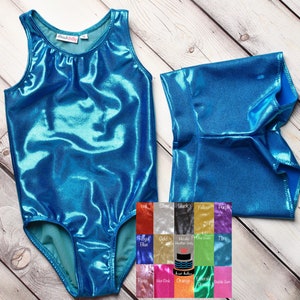 May include: A turquoise leotard and matching shorts made of shiny fabric. The leotard has a scoop neck and sleeveless design. The shorts are a high-waisted style. A color chart is shown below the garment with various colors.