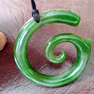 Nephrite jade  Maori Koru spiral pendant. S229