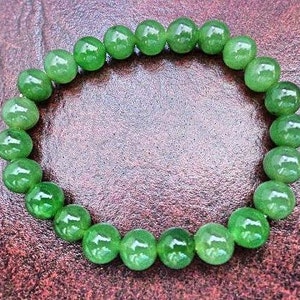 8 mm Nephrite jade round bead bracelet. S451 image 1