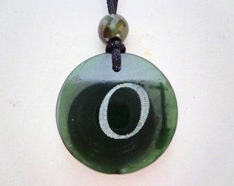 Nephrite jade sparkle faceted bead and O capital pendant. S71