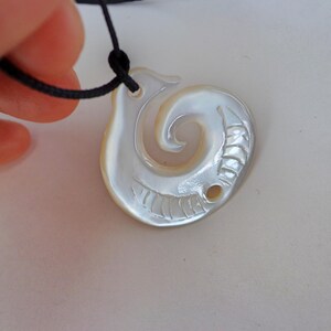 Conch shell spiral carving bird pendant . C6