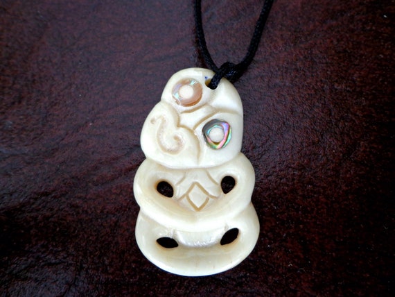 Conch Eyes and Bone Tiki Pendant . B22 - Etsy