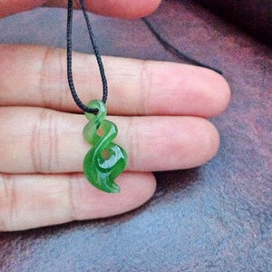 Nephrite jade double twist  pendant . S527