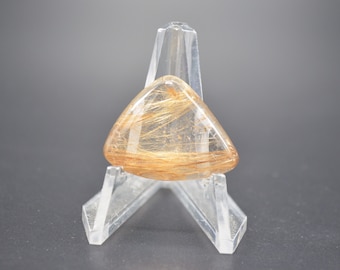 Rutilated quartz cabochon