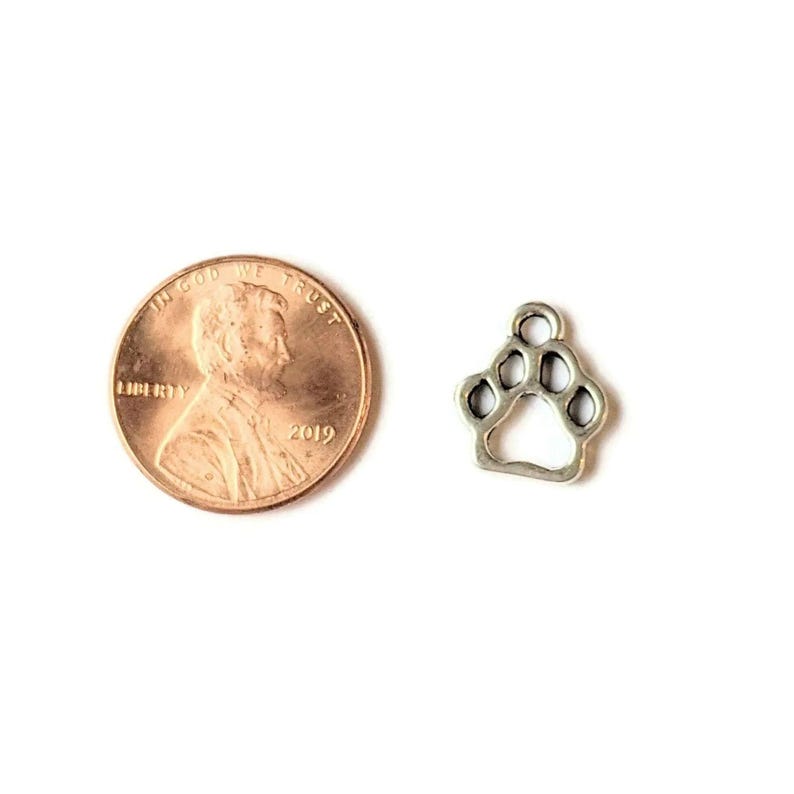 Tiny Dog/Cat Paw Print Charm - - LadybugfeetDesigns -