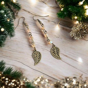Antique Bronze Filigree Leaf dangle earrings - - LadybugfeetDesigns -