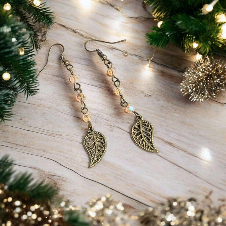 Antique Bronze Filigree Leaf dangle earrings - - LadybugfeetDesigns -