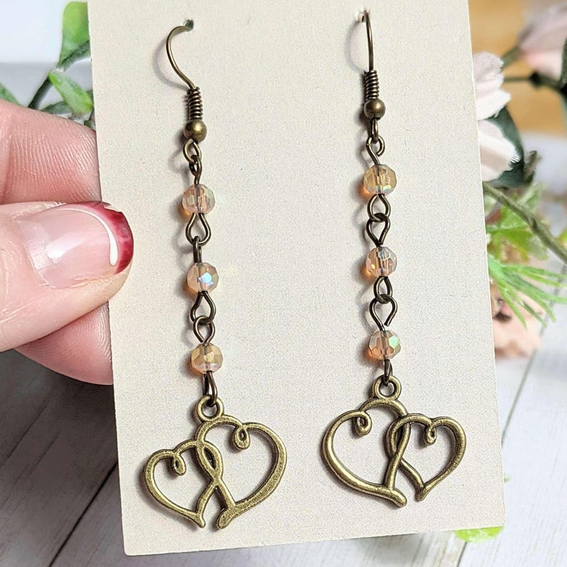 Antique Bronze Boho Double Heart dangle earrings - - LadybugfeetDesigns -