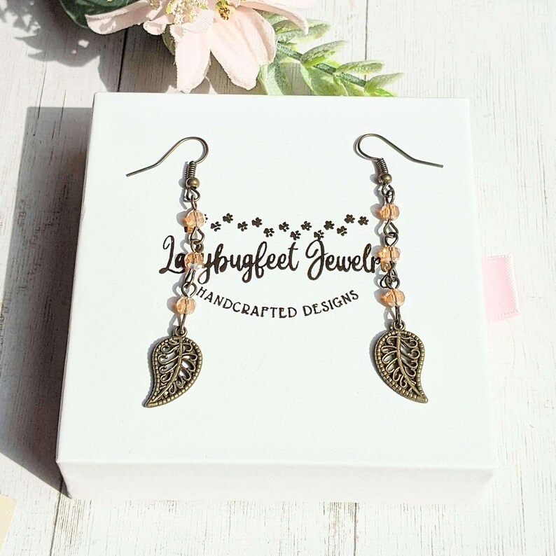 Antique Bronze Filigree Leaf dangle earrings - - LadybugfeetDesigns -